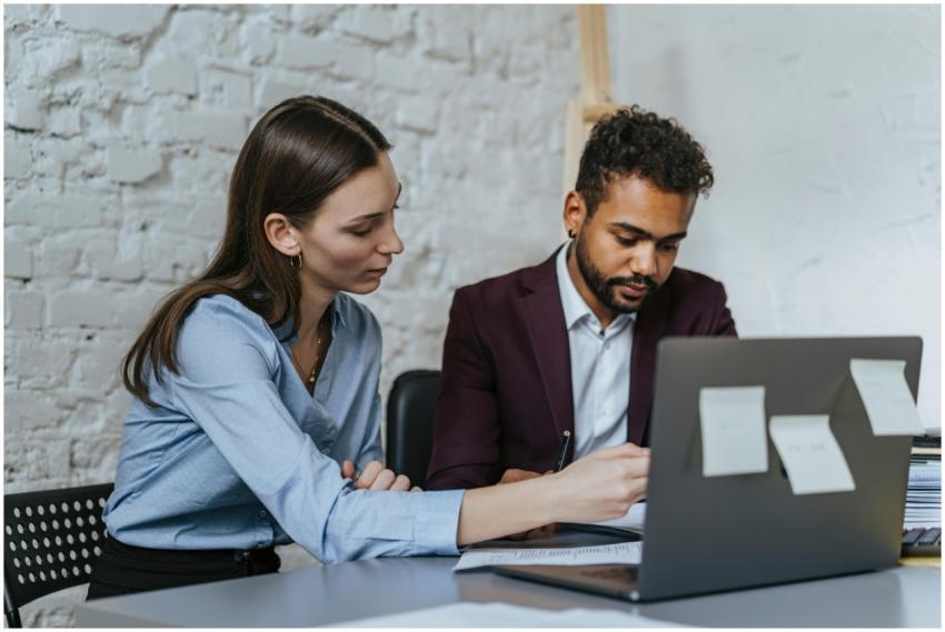 Focused business professionals collaborating in a