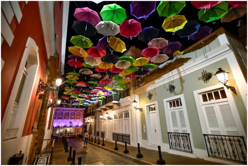 A stunning display of colorful umbrellas hanging o