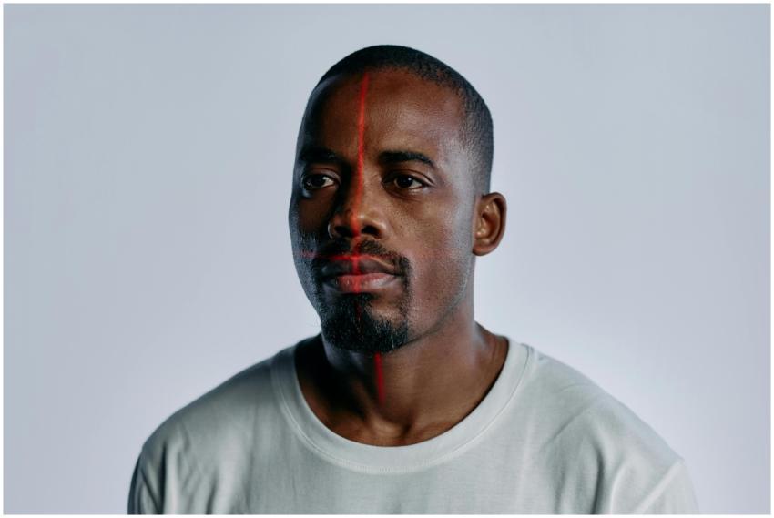 Portrait of an adult man with laser grid on face i