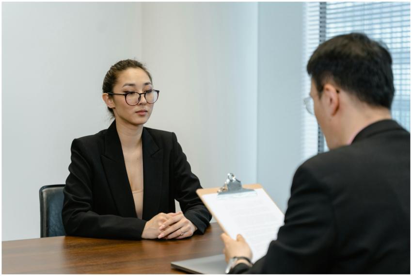 Business interview scene with professionals in off