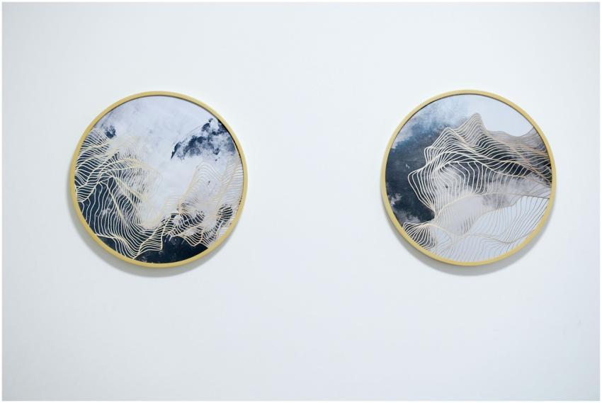 Two abstract circular paintings with gold frames o