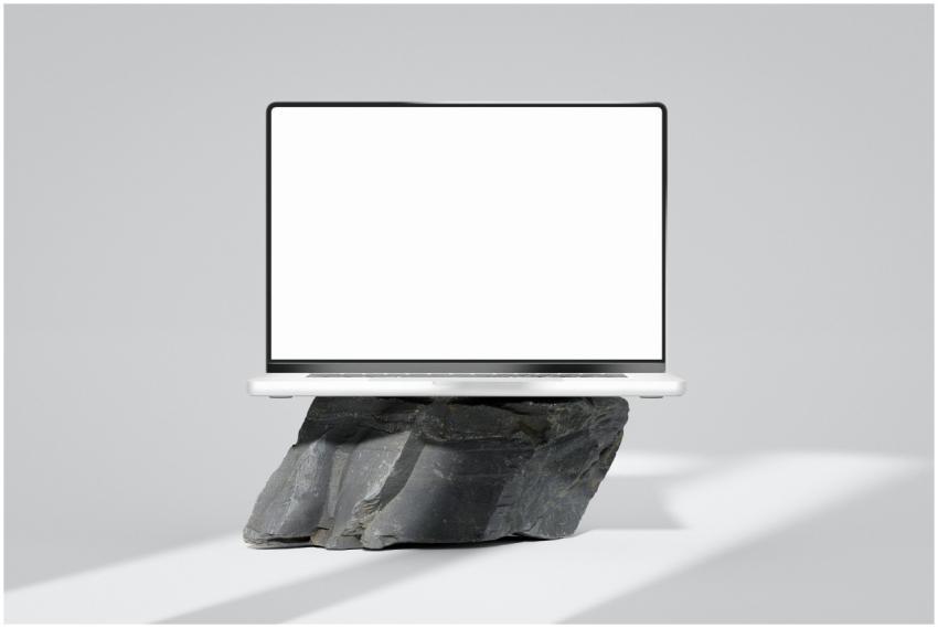 A minimalist image of a laptop with a blank screen