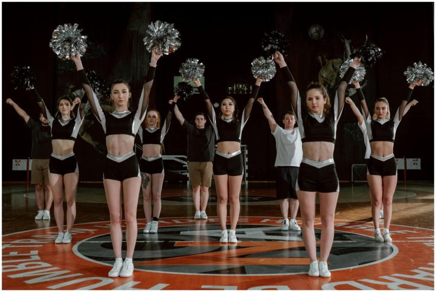 Dynamic group of cheerleaders performing a routine