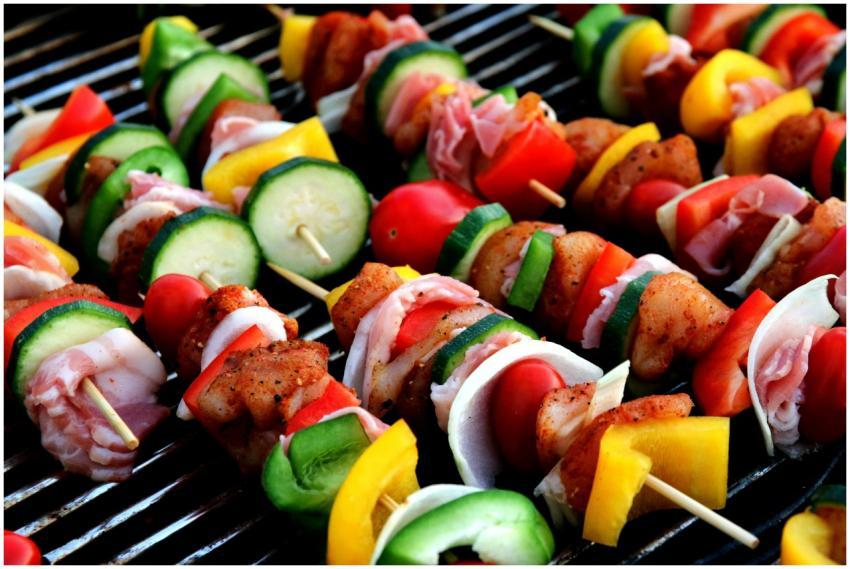 Freshly grilled colorful skewers with mixed vegeta