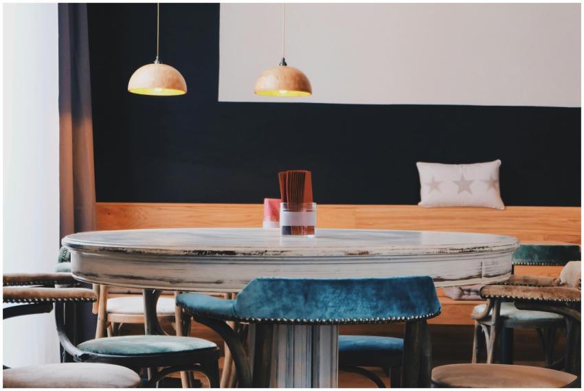 A stylish café interior featuring vintage wooden f