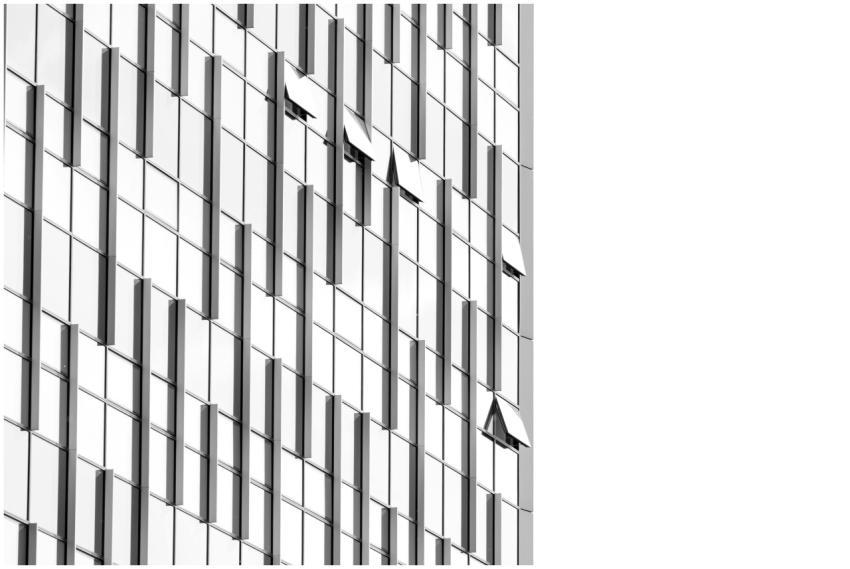 Low angle view of a futuristic skyscraper with geo