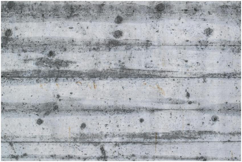 Detailed view of a gray textured concrete wall wit