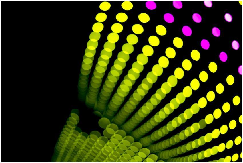 Colorful bokeh light patterns with vibrant yellow