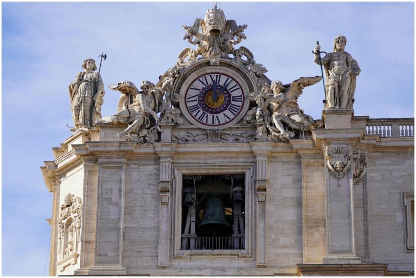 Close-up of St. Peter's Basilica clock tower featu