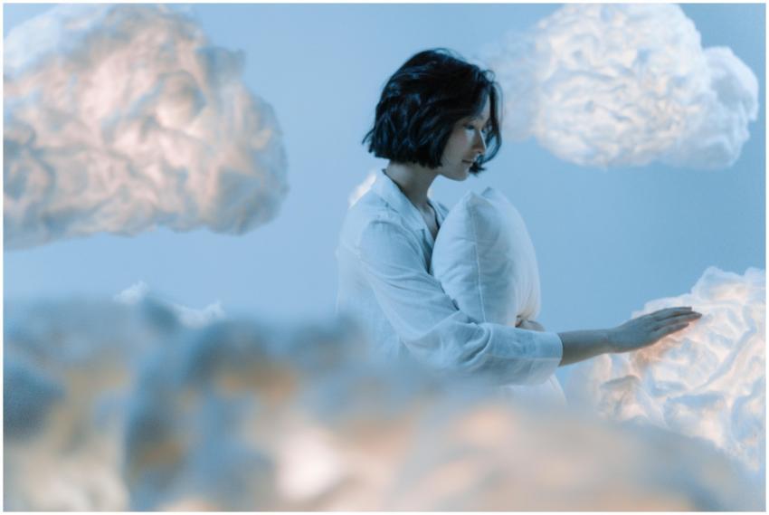 A serene scene of an Asian woman dreaming among so