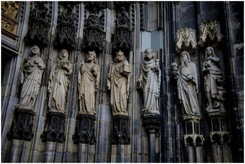 Detailed view of Gothic sculptures adorning the fa