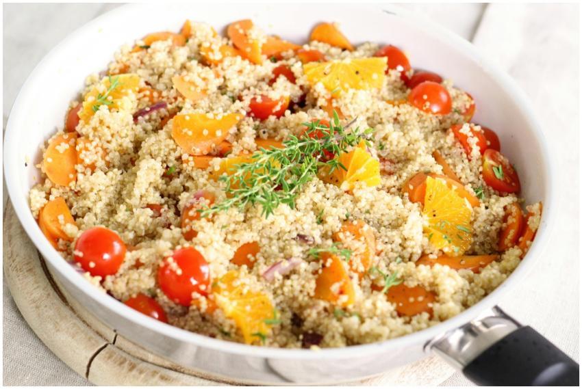 Delicious vegan quinoa salad with tomatoes, orange