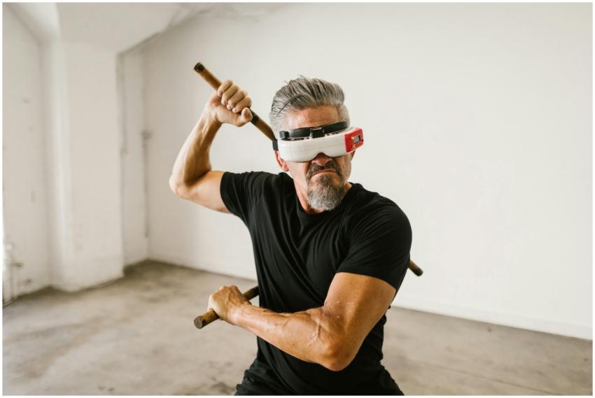 Man practicing martial arts with virtual reality h