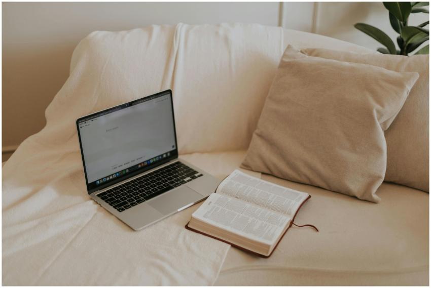 A serene home workspace featuring a laptop and ope