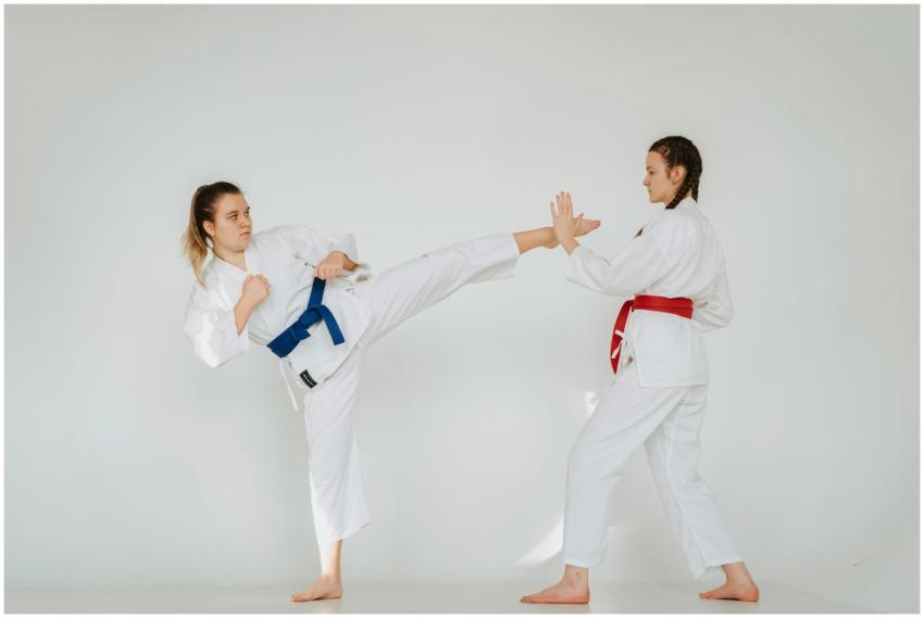 Dynamic shot of two women practicing martial arts