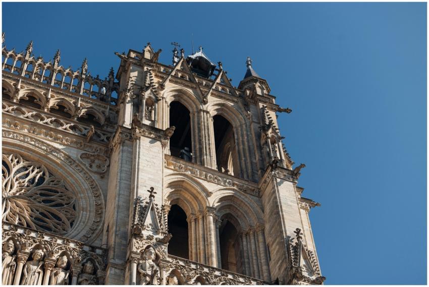 Close-up of Amiens Cathedral facade featuring intr