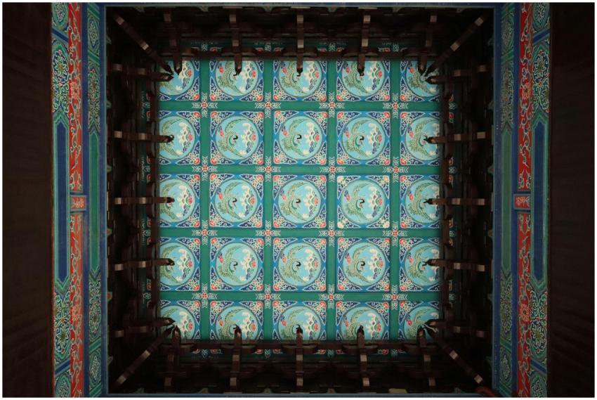 Intricate traditional ceiling design with vibrant