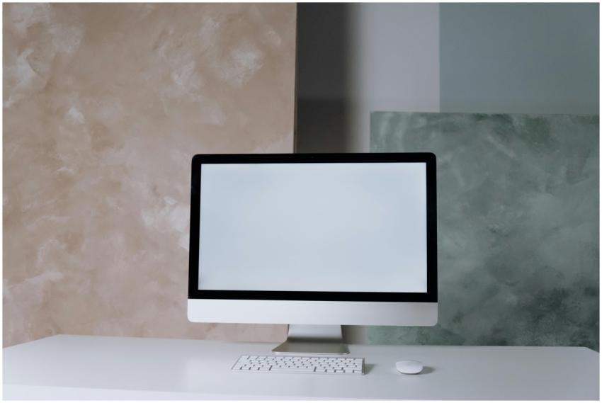 Elegant desktop setup featuring a computer screen,