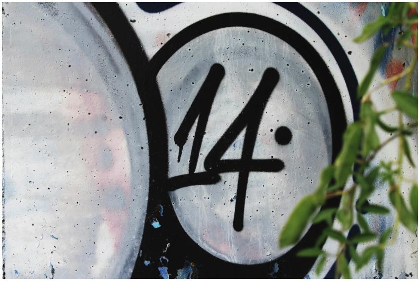 A detailed view of graffiti art featuring the numb