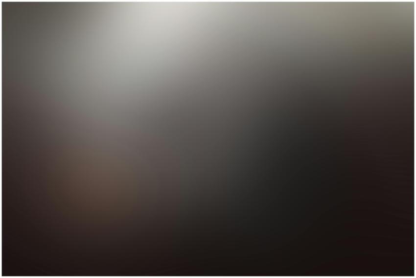 A dark and moody abstract image with soft gradient