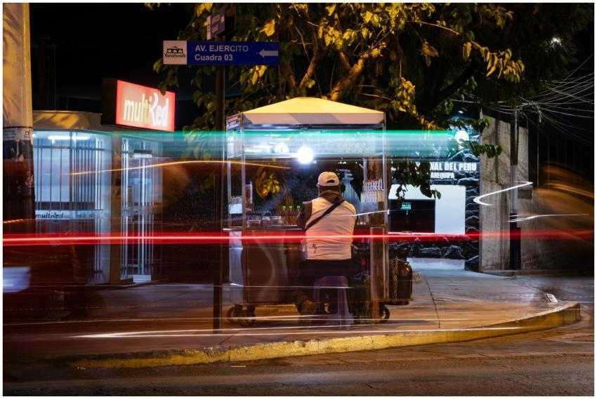 Street vendor at night in Arequipa, capturing urba