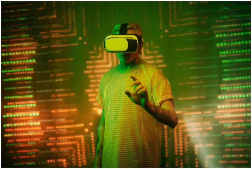 Person immersed in virtual reality, illuminated by