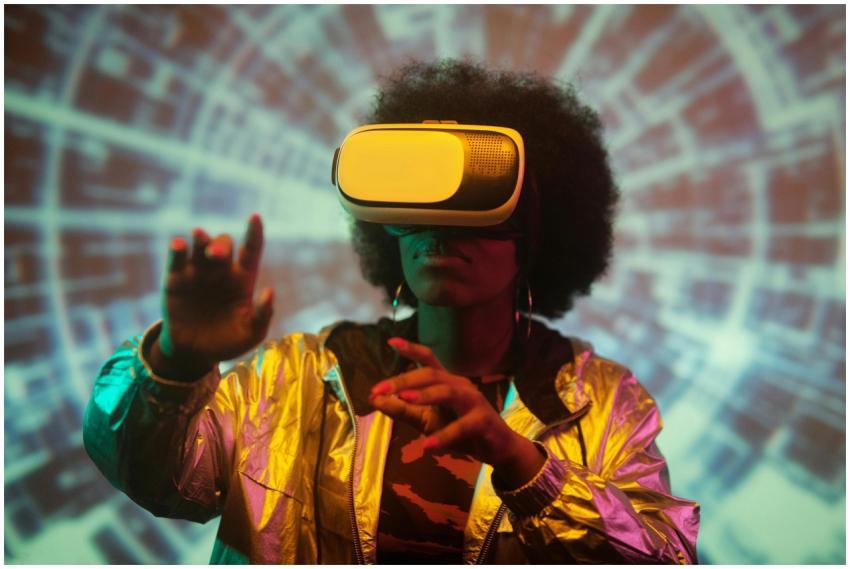 Black woman exploring virtual reality with headset