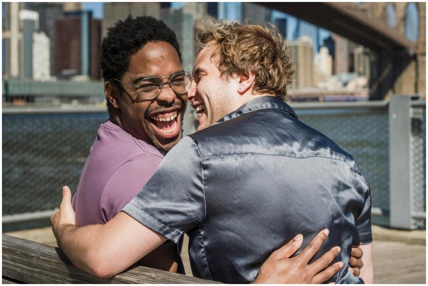 Interracial gay couple enjoying a sunny day by the