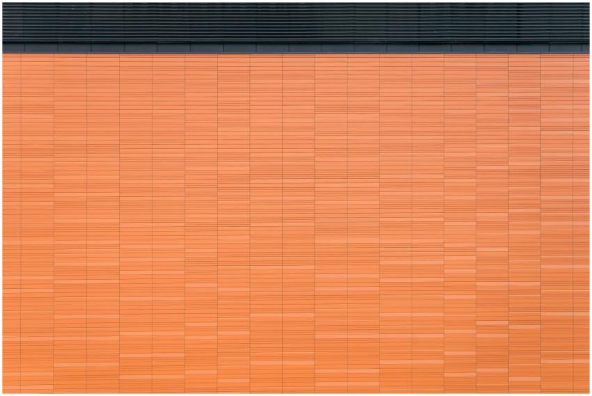 Detailed view of an orange brick wall with horizon