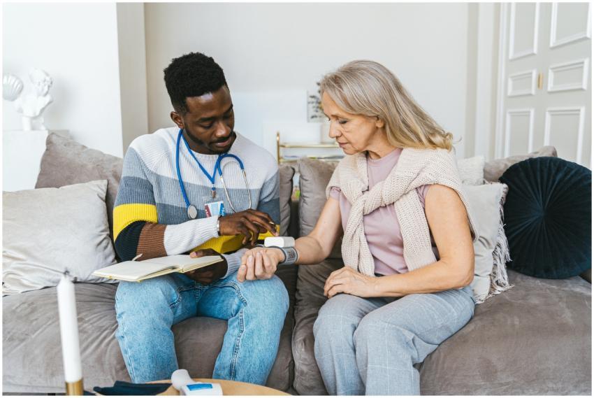Healthcare professional checking blood pressure of