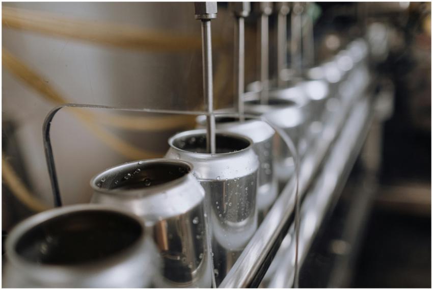 Detailed view of an industrial canning process wit