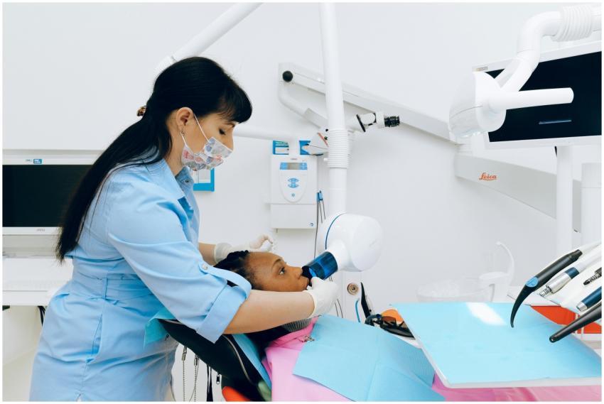 Dentist performs a dental procedure using advanced