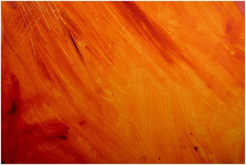 Close-up of an abstract painting with vibrant oran