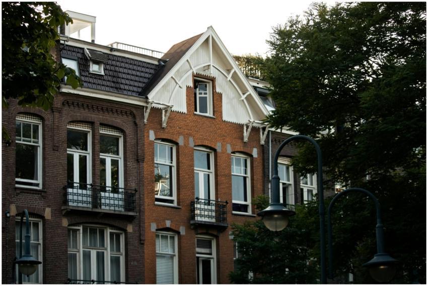 Vintage-style brick building in Amsterdam surround