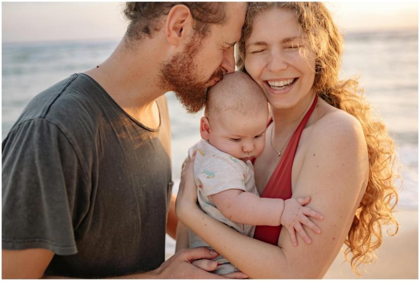 A cheerful family moment with parents and baby by