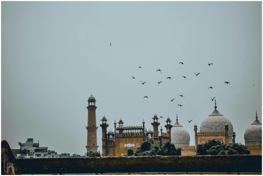 Scenic view of Badshahi Mosque in Lahore with flyi