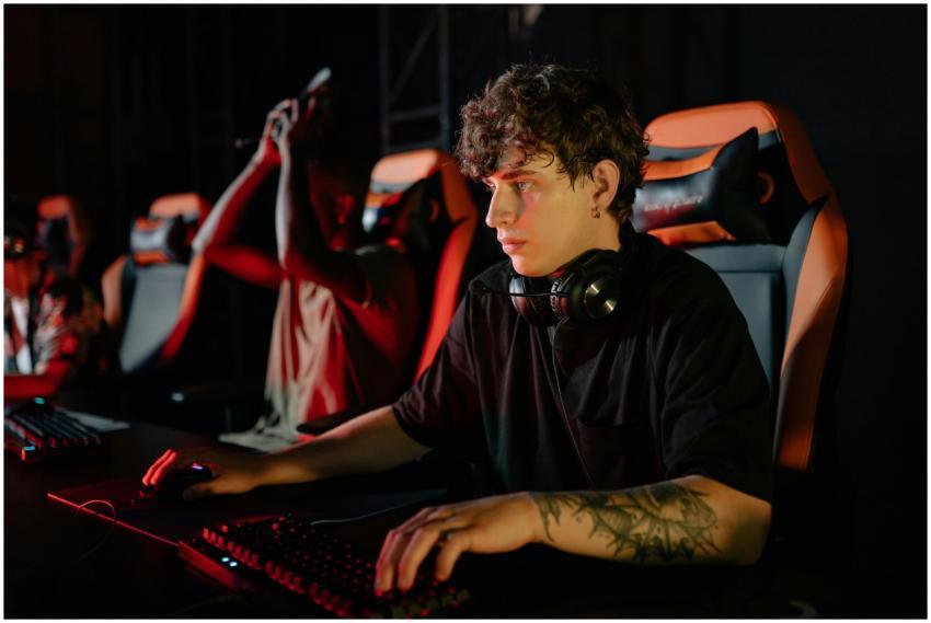 Competitive gamers in an esports tournament concen