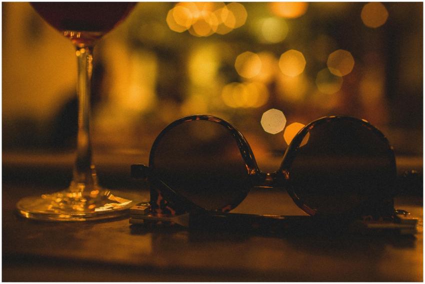 Composition of glass with refreshing drink on thin