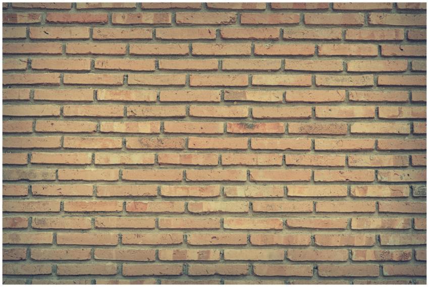Close-up photo of a vintage textured brick wall, p