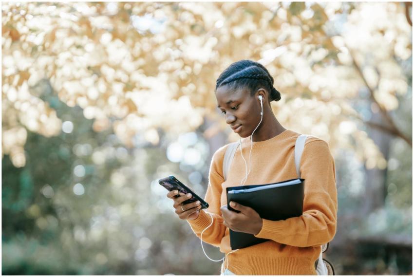 Positive young African American female student wit