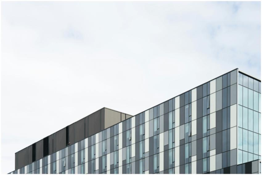 Contemporary glass office building exterior showca