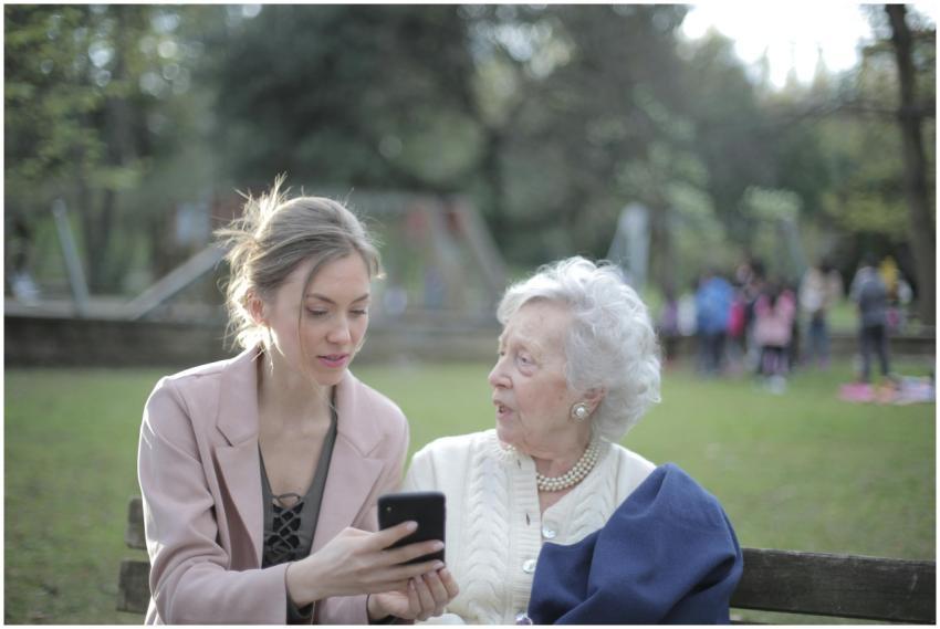 A young woman helps an elderly lady navigate a sma