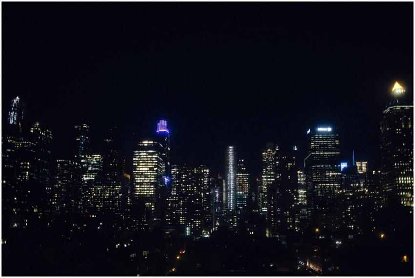 Iconic New York City skyline lit up at night showc