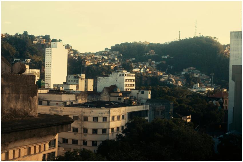 Scenic cityscape with hillside view and buildings