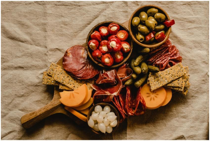 High angle view of a rustic charcuterie board feat