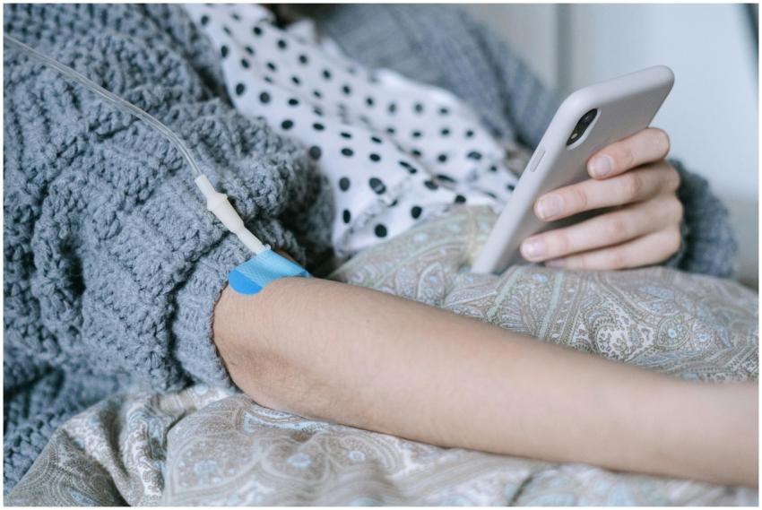 A woman receiving intravenous therapy for cancer t
