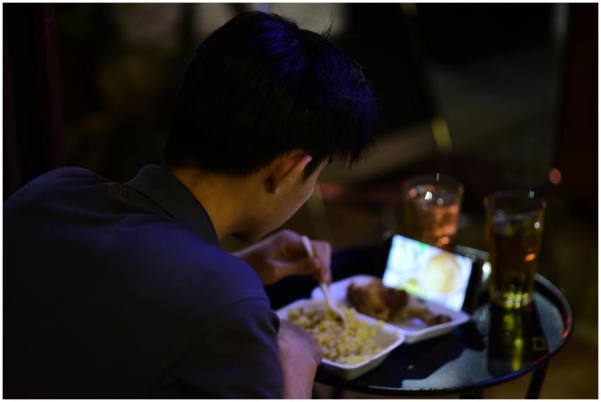 Young Adult Dining While