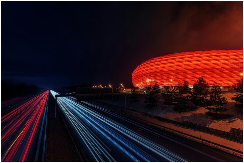 Capture of Allianz Arena illuminated at night with