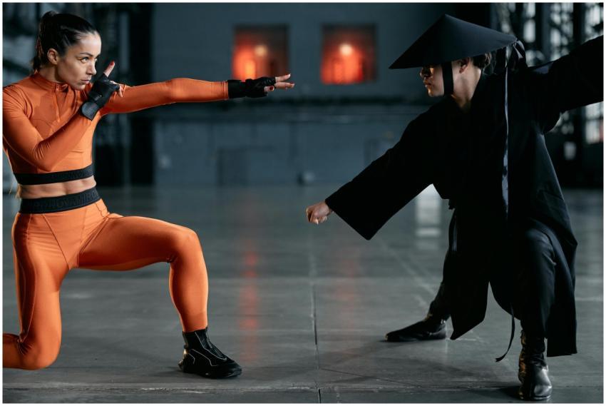 Two martial artists in a fierce pose, showcasing m