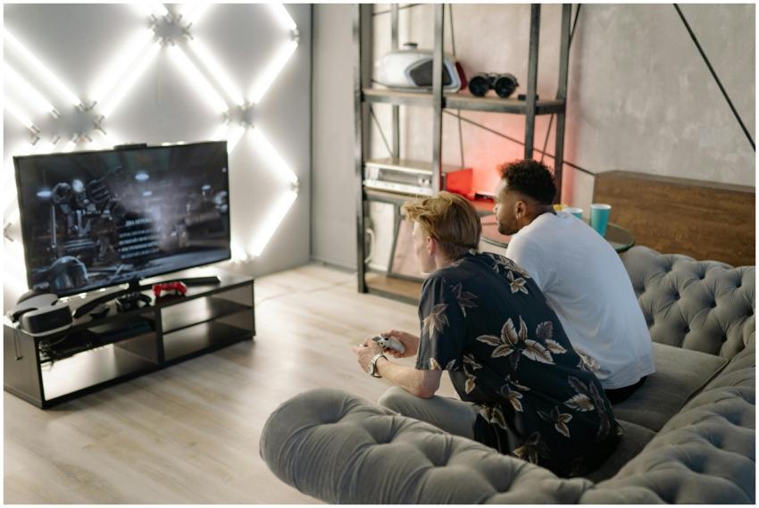 Two young men gaming together in a stylish modern